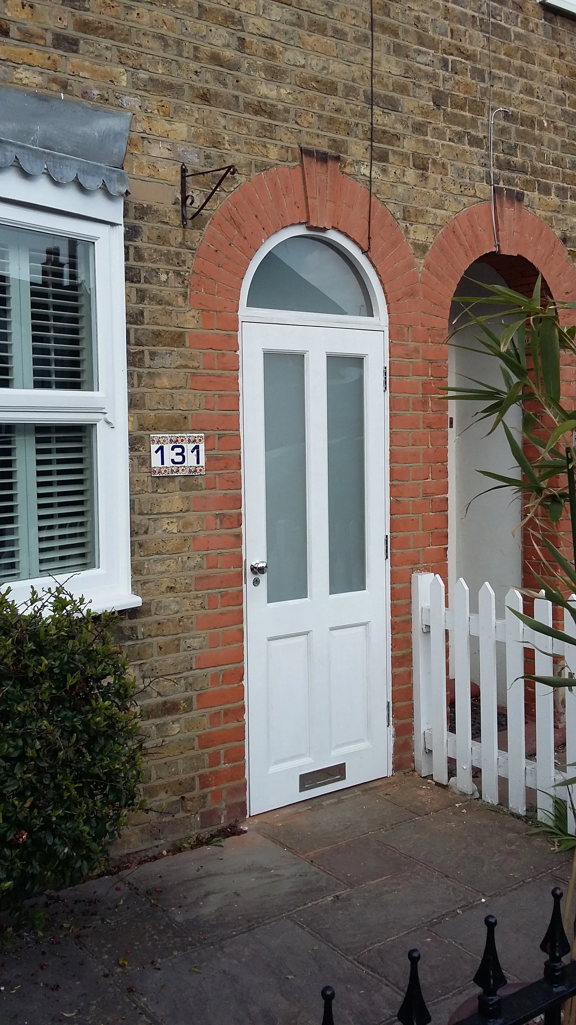 Porch Door with shaped fixed fanlight