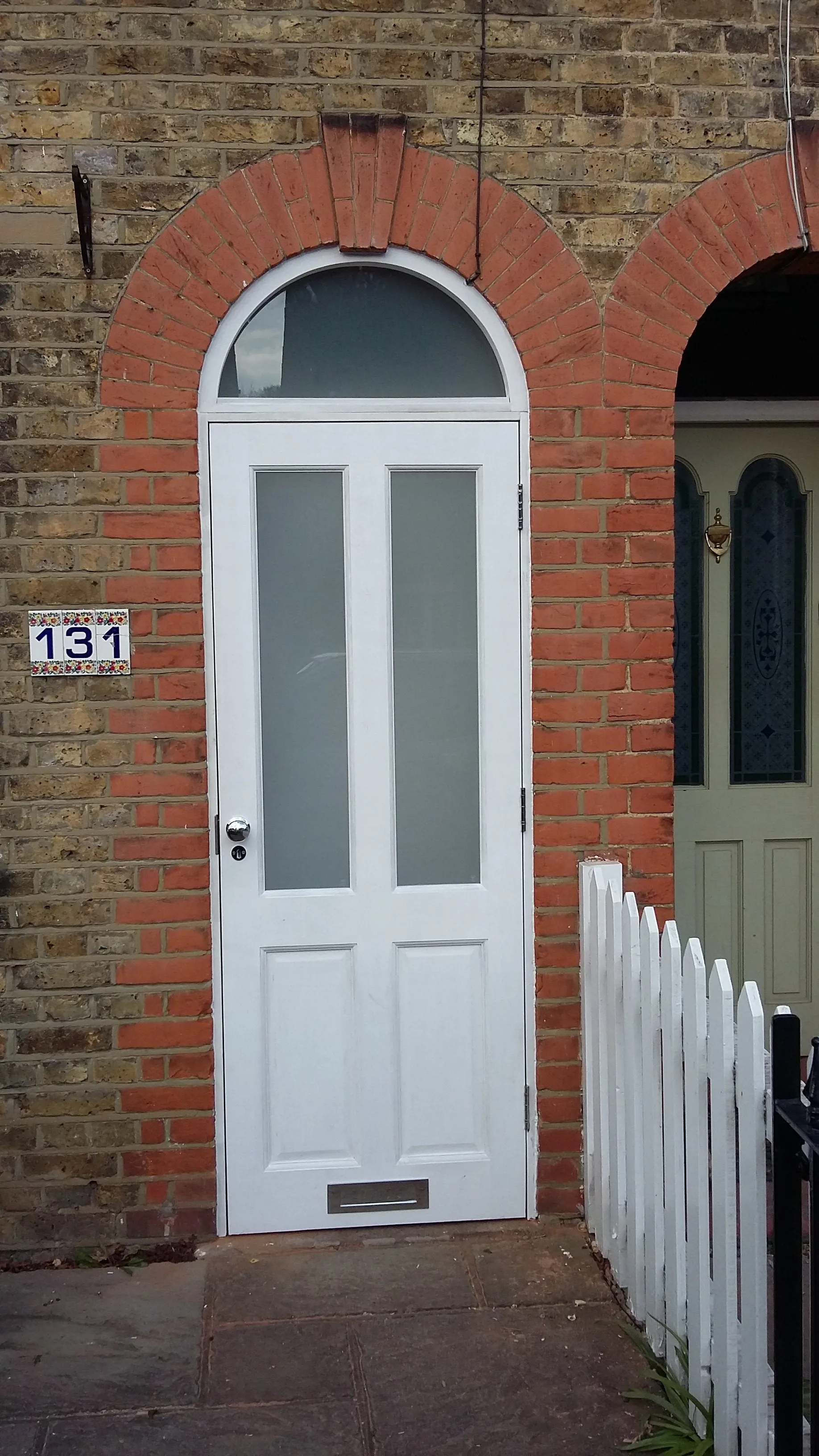 Porch Door with shaped fixed fanlight